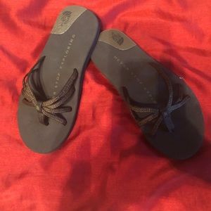 Brown North face flip flops
